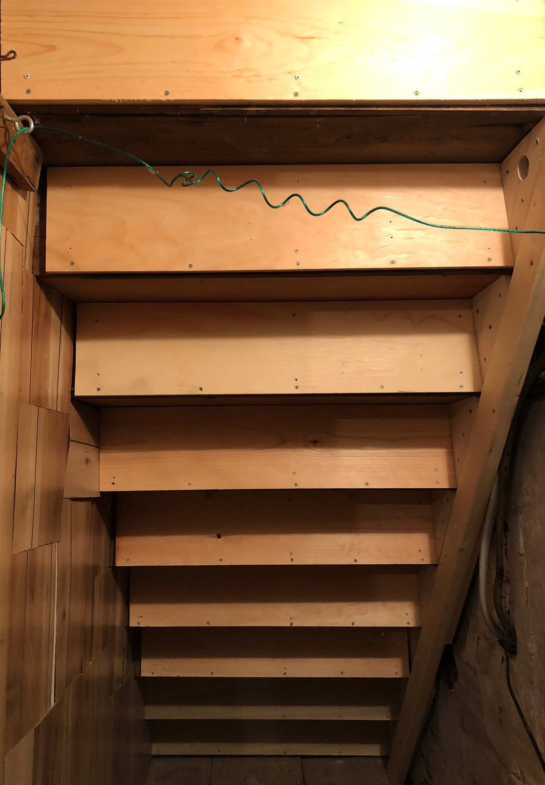 Rebuilt cellar stairs with new treads and closed risers